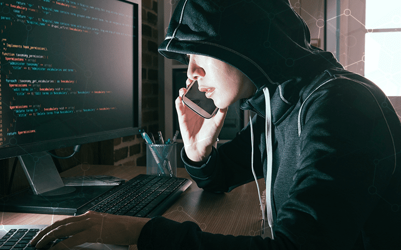 Hacker on a mobile phone