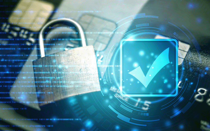 A lock and a checkmark on top of credit cards represent the payment card industry